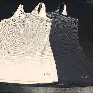 REPOSH x2 Oakley tanks, both Med